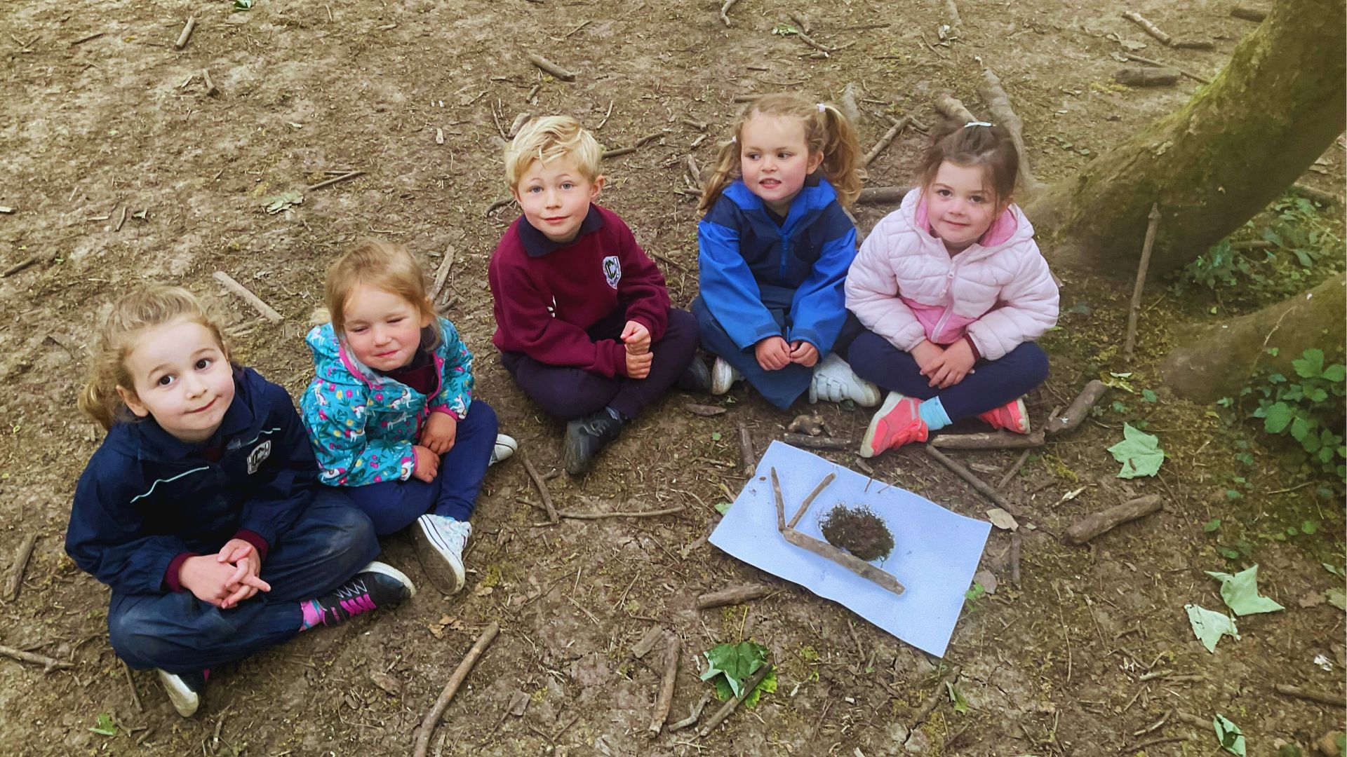 A photo of a claires court nursery pupils at Forest School
