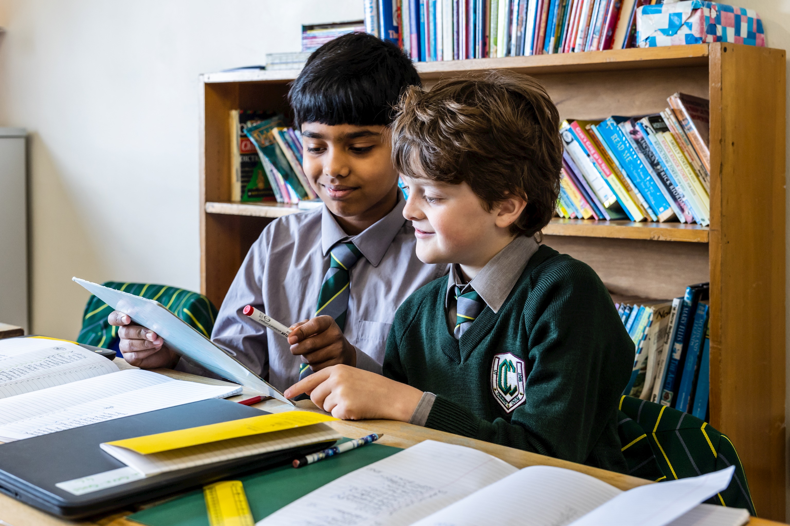 photo of claires court junior boy pupil in class