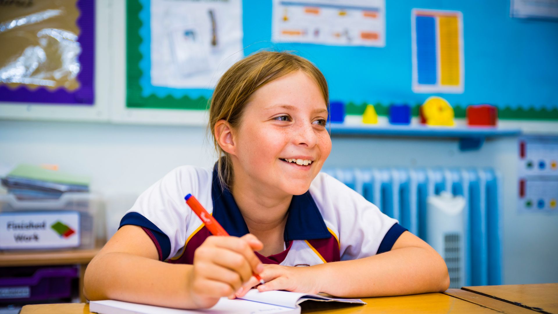 photo of claires court junior girl pupil in class