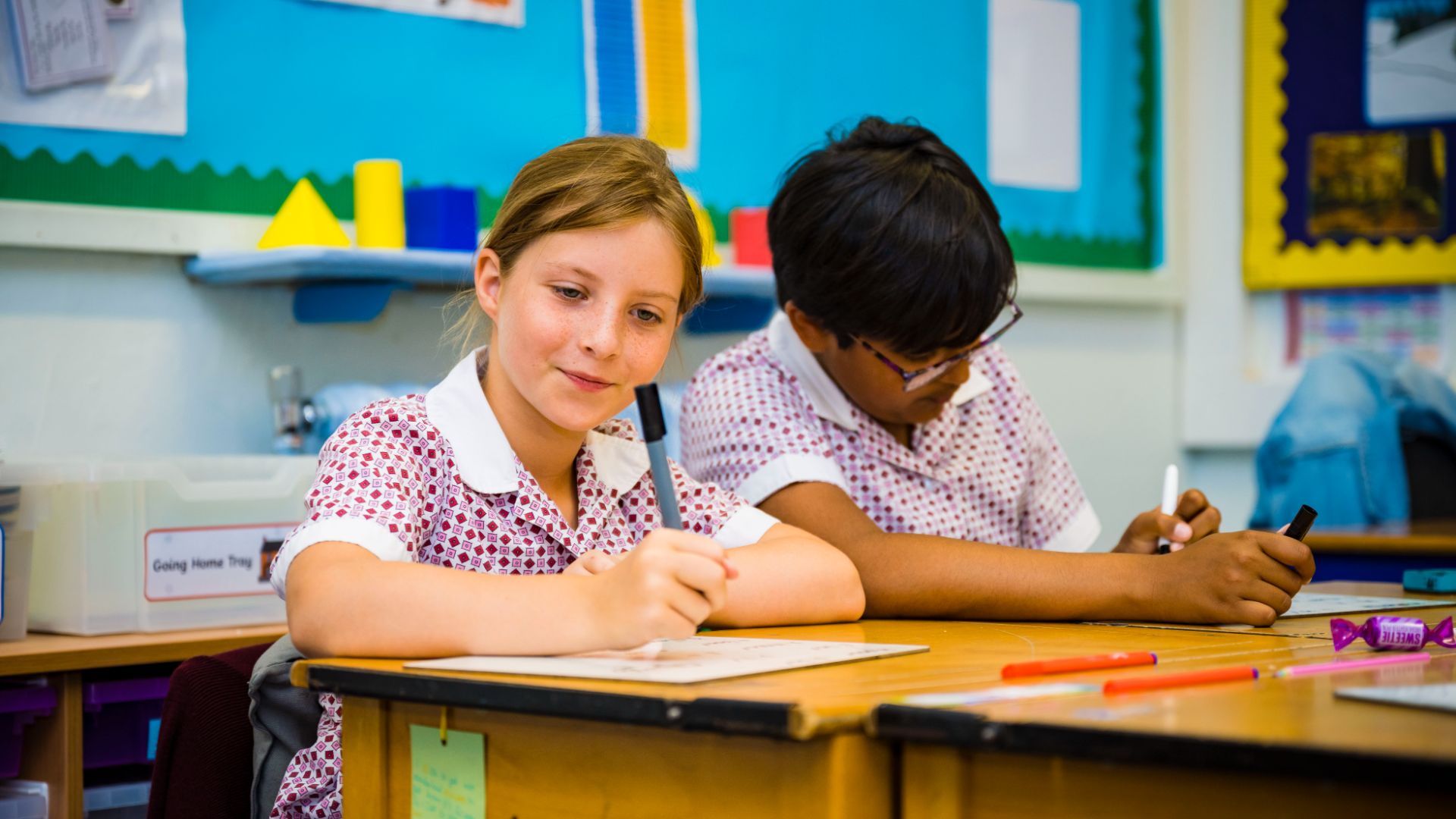 photo of claires court junior girl  pupil in class