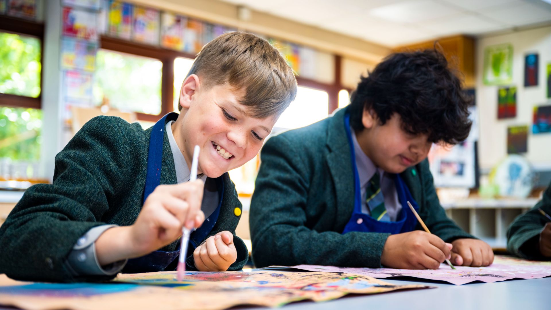 photo of claires court senior boy pupils in art class