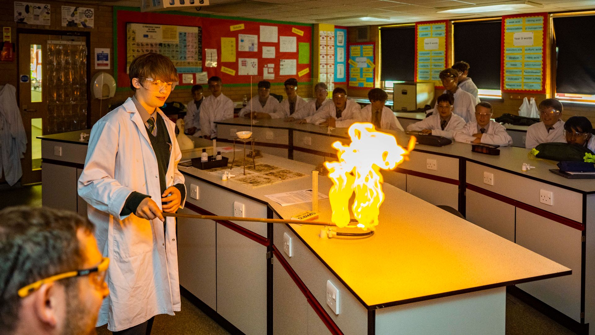 photo of claires court senior boy pupils in science class
