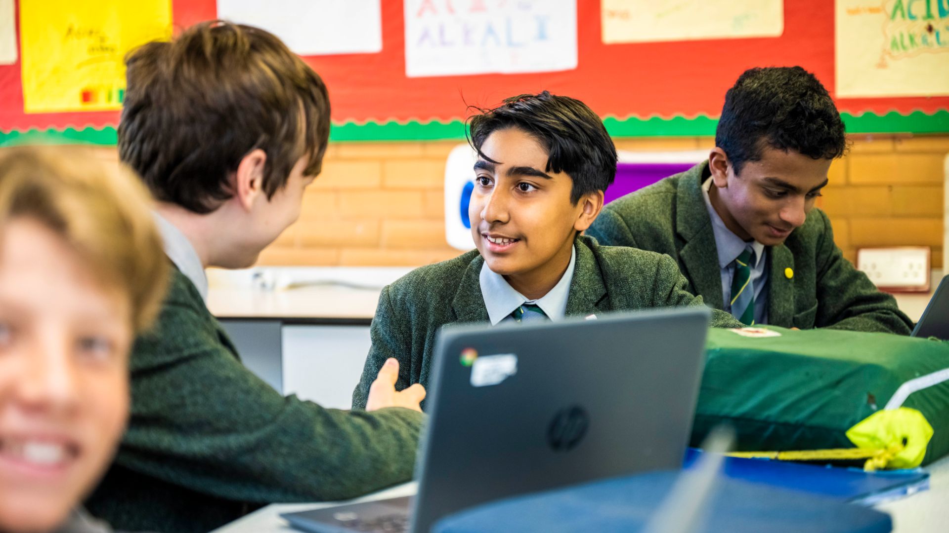 photo of claires court senior boys students in class