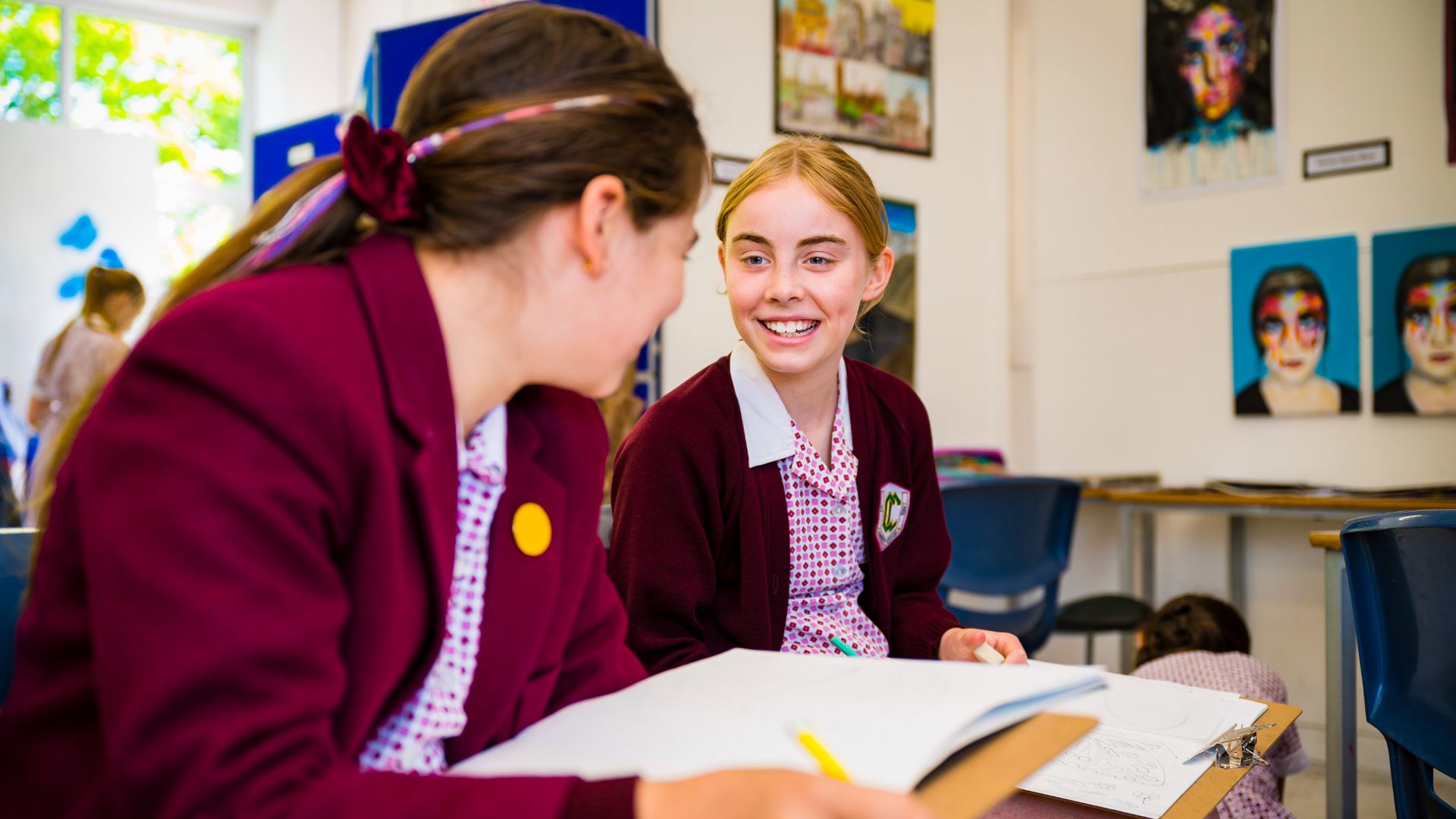 photo of claires court senior girl pupils talking to each other