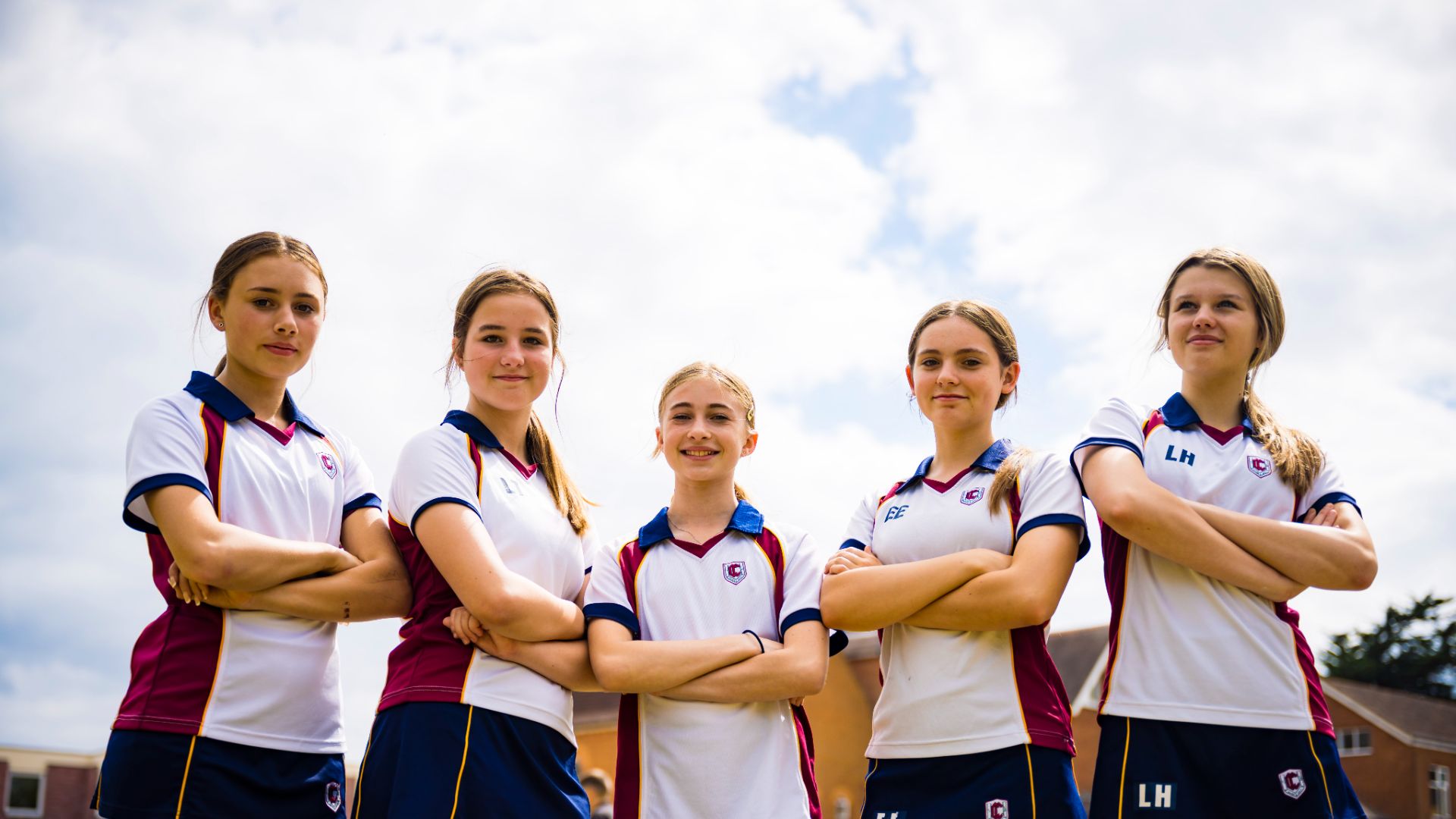 photo of claires court senior girl pupils together as a team for sports day