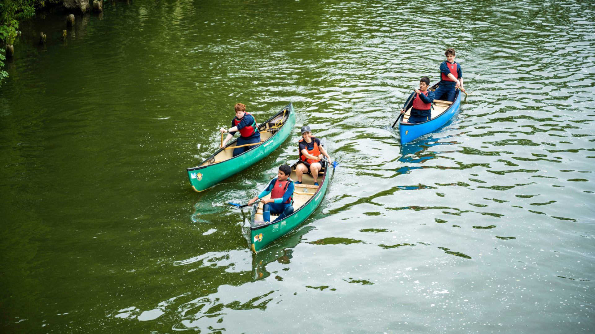photo of boys kayaking
