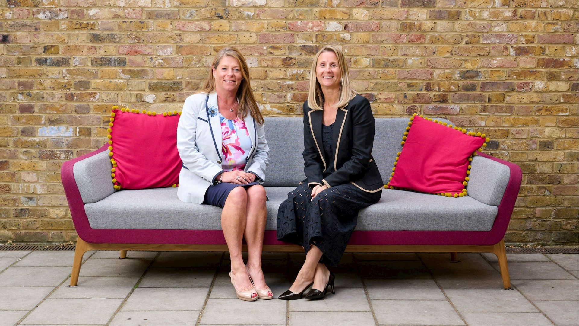 Photo of the admissions team, Heidi and Louise on the Claires Court sofa